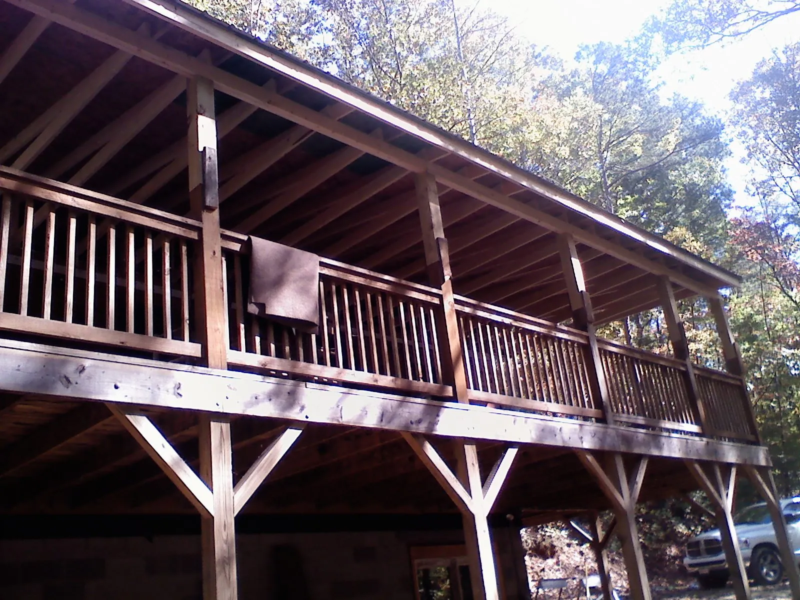 Timber framing under a new elevated porch and deck — Roof Leak Repair in Natural Bridge Station by Roofing Brothers